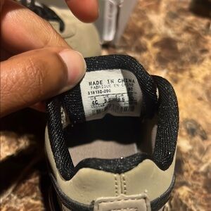 Nike Black and Gray Sneakers with Cushioned Collar